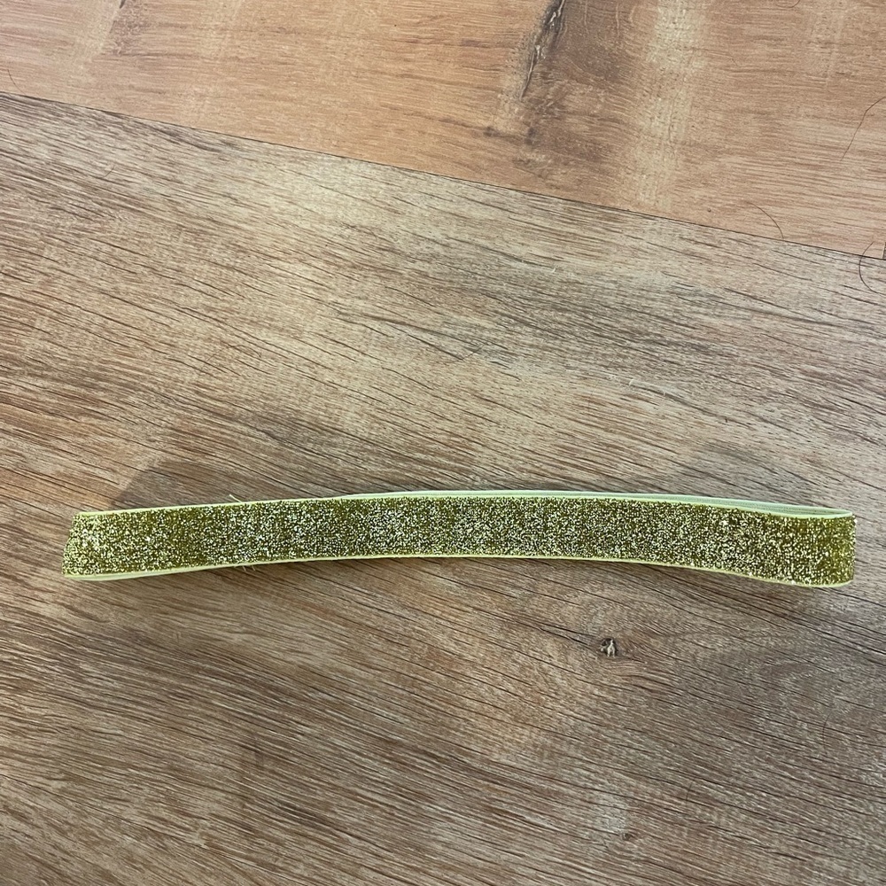 Gold toned sparkly headband​​​​​​​​